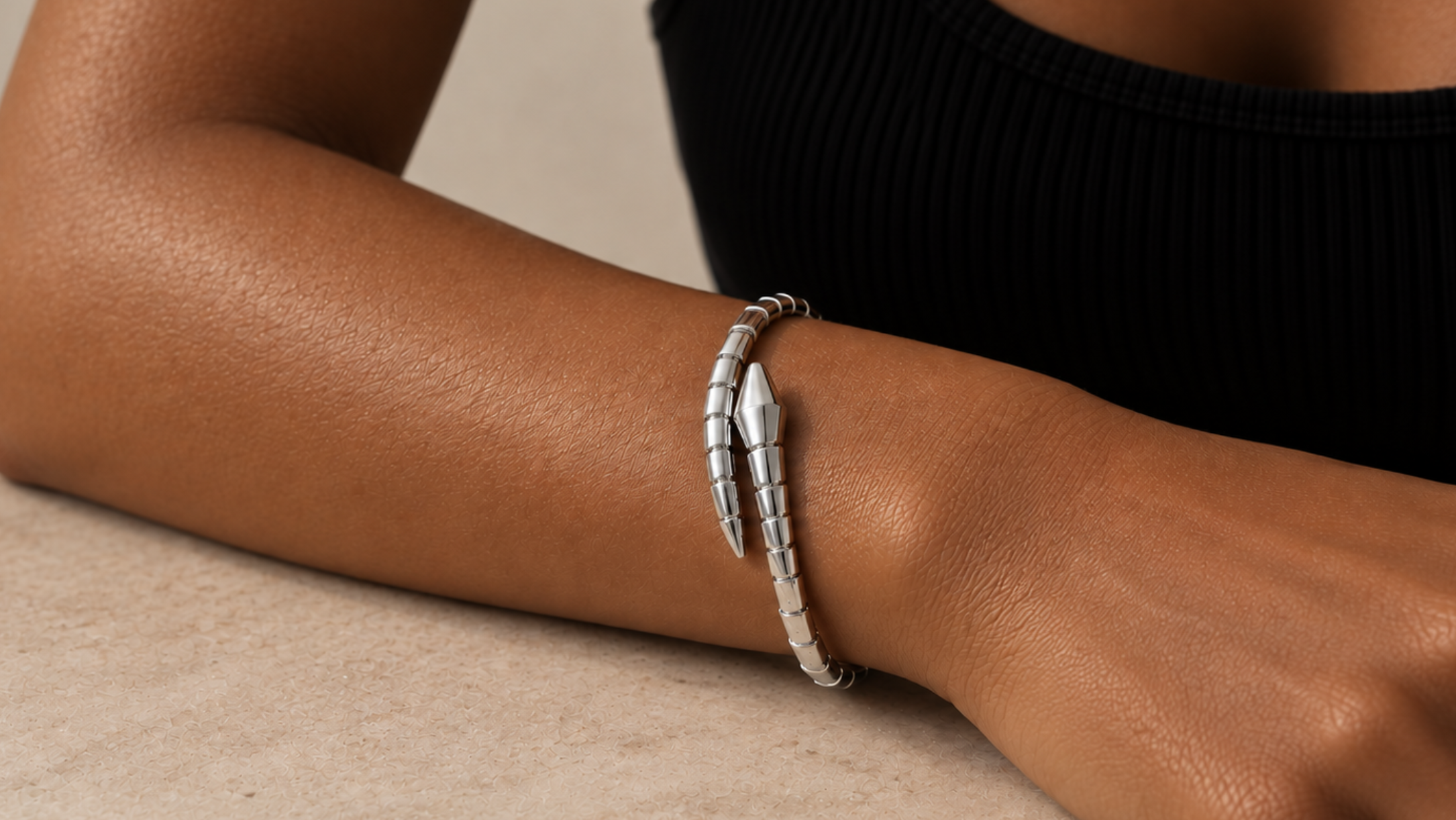 Bvlgari white gold Serpenti bracelet on model's wrist